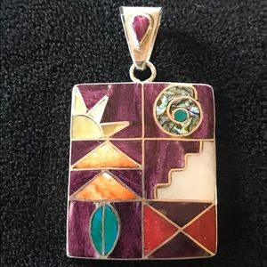 Silver pendant from Peru.